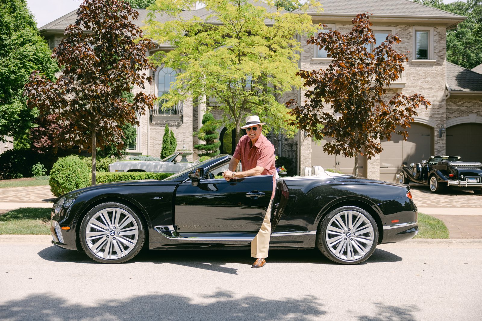 Kevin Trudeau with his Bentley at his estate